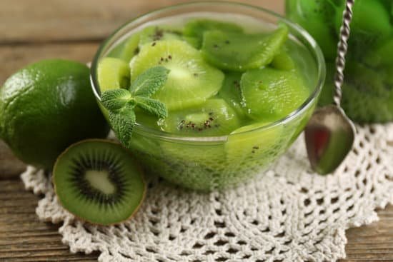 canva a glass bowl of sliced kiwi in syrup MAD MGcwu U