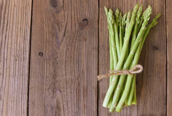 canva asparagus on a table MAEAhvrcCMU