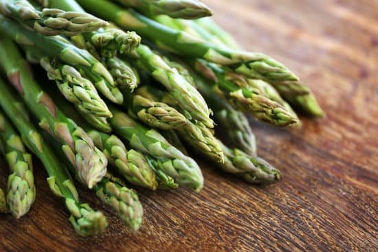 canva asparagus on wooden table MAD