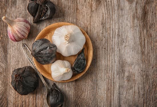 canva assorted garlic on wooden table MAD8Sp3gecI