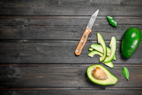 canva avocado and small slices of avocado with a knife. MAEPtzLC99I