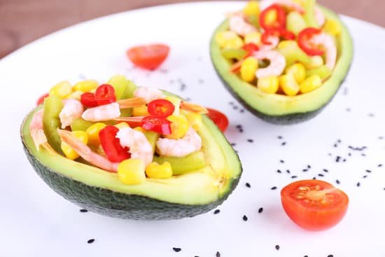 canva avocado salad on a plate up close MAD L 9XuT0