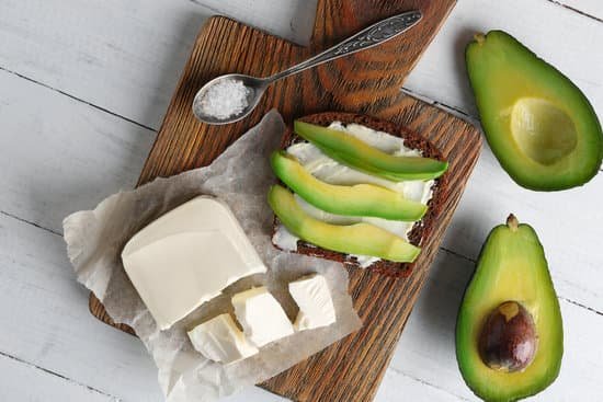 canva avocado sandwich with cheese on wooden board MAD Qvig4jU