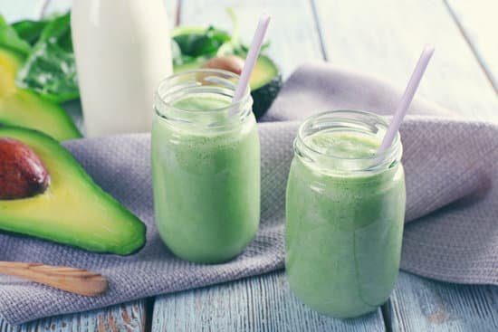 canva avocado smoothie on wooden table MAD QkB1 Q0