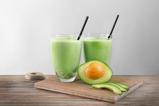 canva avocado smoothies above wooden board MAD Qt7upNQ