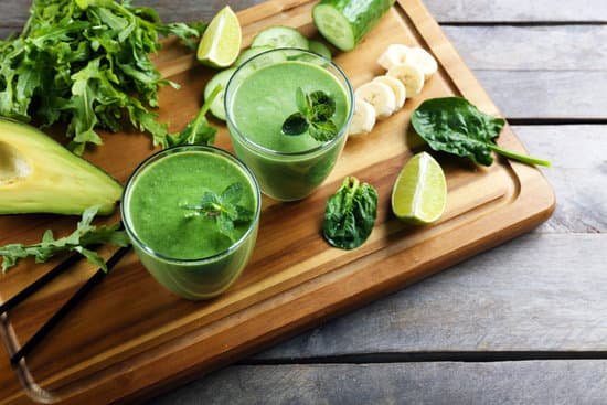 canva avocado smoothies and spinach on wooden board MAD Qj0kdgg