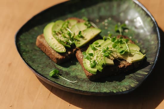 canva avocado toast on green plate MAERFeclGC0