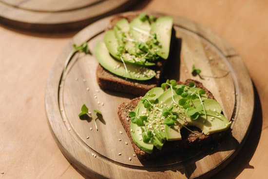 canva avocado toast on wooden board MAERFcAbN7U