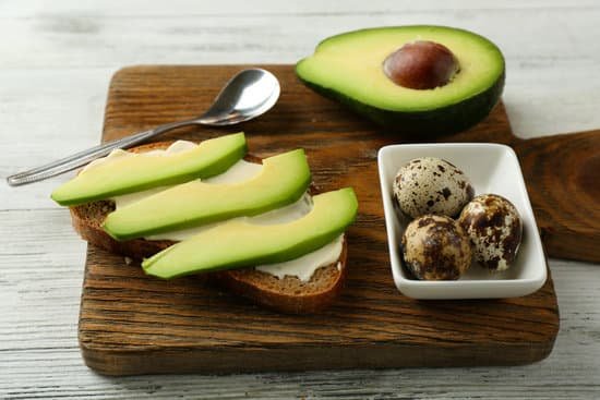 canva avocados and quail eggs on a wooden board MAD MXZ6D 8