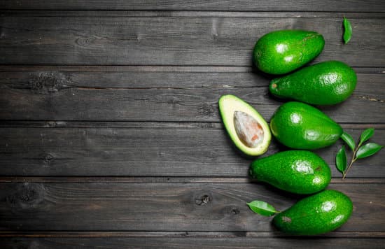 canva avocados on a wooden table MAEPf Khu s