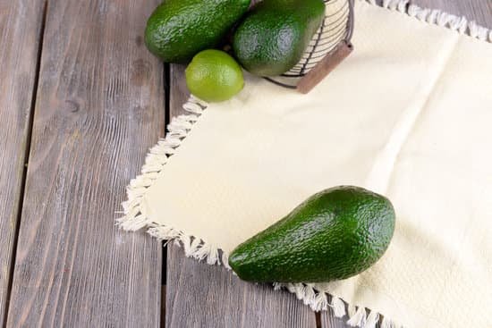 canva avocados with lime copy space MAD MIvAH3c