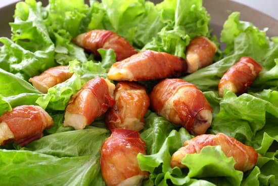 canva bacon wrapped chicken on lettuce MAD9UKwEm8I