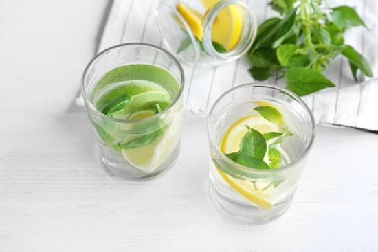 canva basil water in glassware on table MAD9T1jtURg