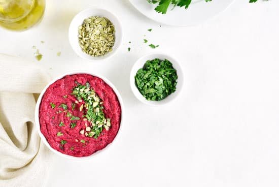 canva beet hummus in a bowl on white background MAEI0JmWA 8