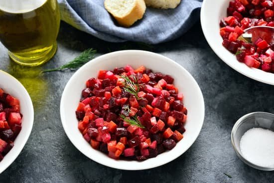canva beet salad in bowl on dark background MAEI0K07Uzk