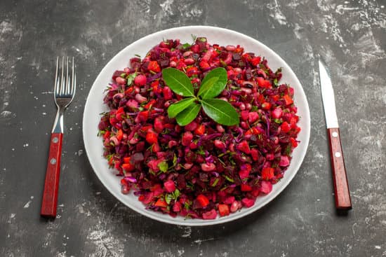 canva beet salad in white plate MAEQjciYN5g