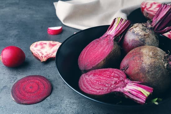 canva beet slices with radishes on grey table MAD