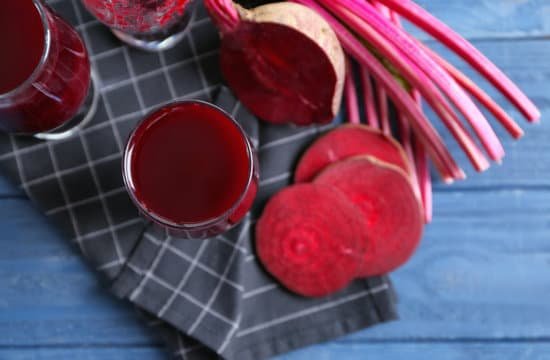 canva beet smoothies and sliced beetroot on wooden table MAD9bPg ppY