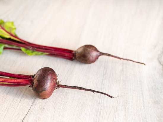 canva beets on wooden background MAERFcREliM