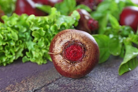 canva beets with leafy greens on a table MAD MdlF Gw