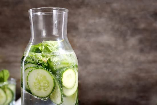 canva bottle of fresh cucumber drink on grunge background MAD9bCAh9RY