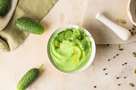 canva bowl with cold cucumber soup on the table MAD7pAbA7t4