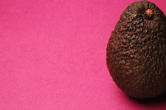 canva brown avocado on purple background MAD f