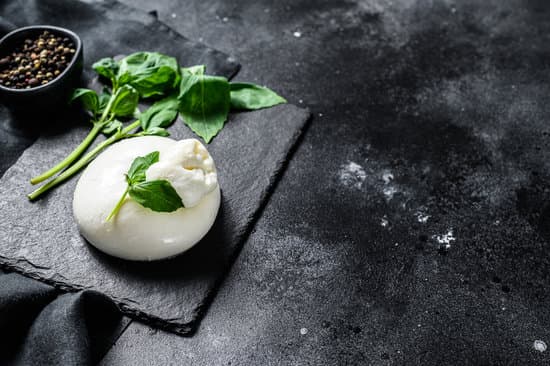canva burrata cheese with basil leaves and pepper MAEQ79RrosY
