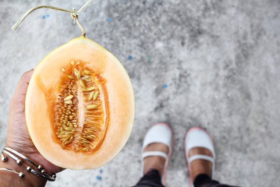 canva cantaloupe melon on hand MADFj9GCw1o