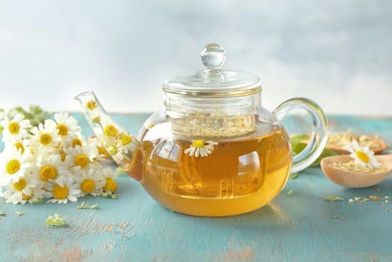 canva chamomile tea on a wooden table MAD9bXy0qgc