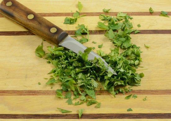 canva chopping fresh cilantro MADGGWkFb88