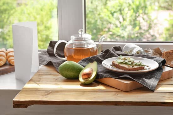 canva composition with delicious toast and avocado on window sill MAD9boVaefU