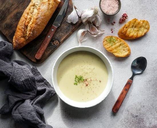 canva creamy garlic soup on a table MAD mC tSyk