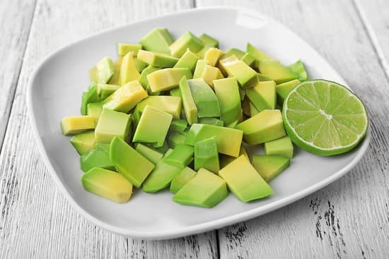 canva cubes of fresh avocado on plate closeup MAD