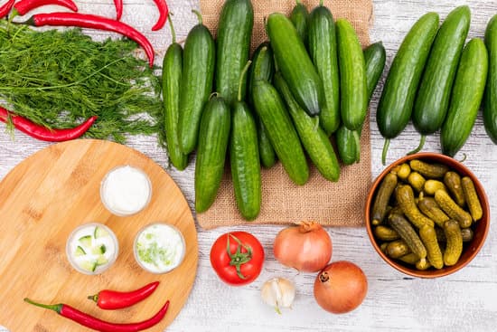 canva cucumber and ingredients on a table MAD gZYE9Is