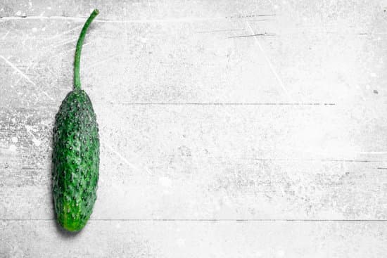 canva cucumber on a wooden table