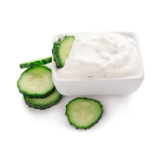 canva cucumber slices and delicious yogurt sauce on white background MAD7FblEnN8