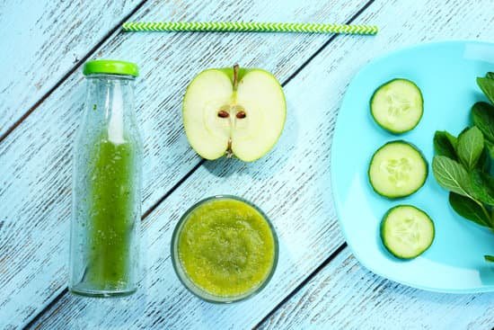canva cucumber smoothie and apple on wooden background MAD Qmihzmw