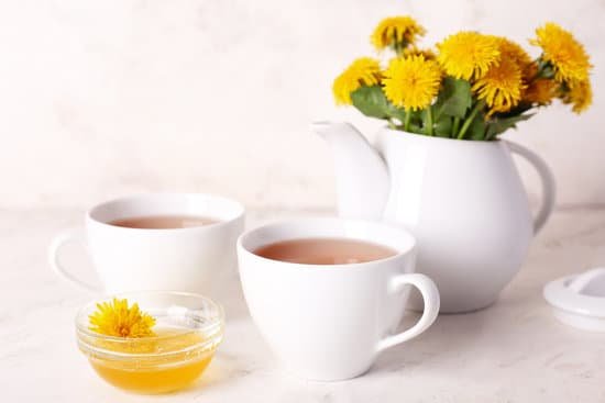 canva cups of healthy dandelion tea with honey on light background MAD8BZiIAaQ
