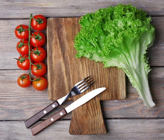 canva cutting board with cherry tomatoes and lettuce MAD MHE497U