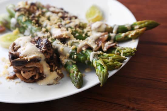 canva delicious dish with asparagus and mushrooms on plate MAD MuNzfeM