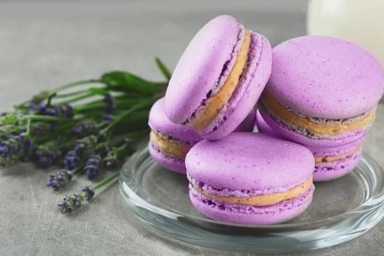 canva delicious macarons and lavender on table MAD Q7 Yczc