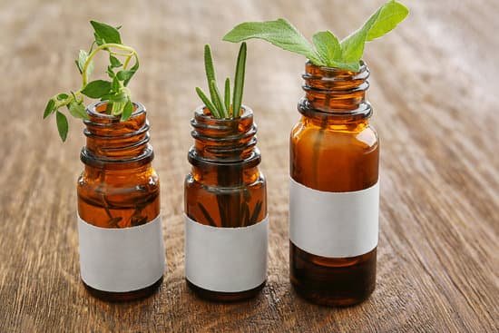 canva dropper bottles and herbs on wooden background MAD Q m fCs