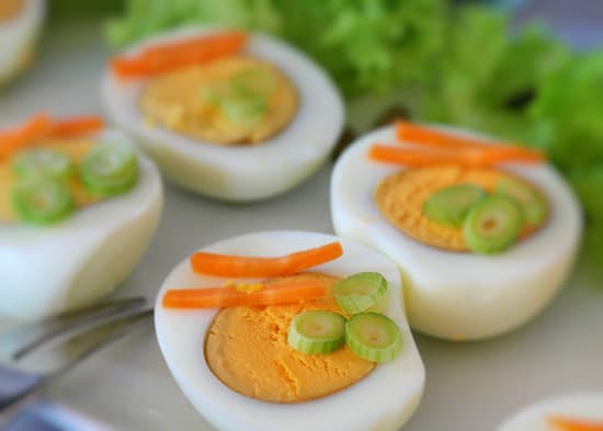 canva egg appetizers with garnishes MADQ5ZGKMS4