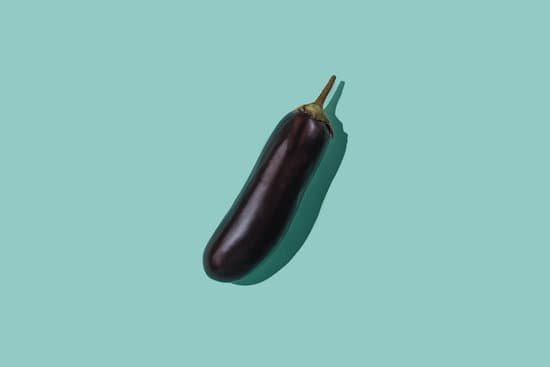 canva eggplant on pastel sky blue background MAEEqaFiIF8