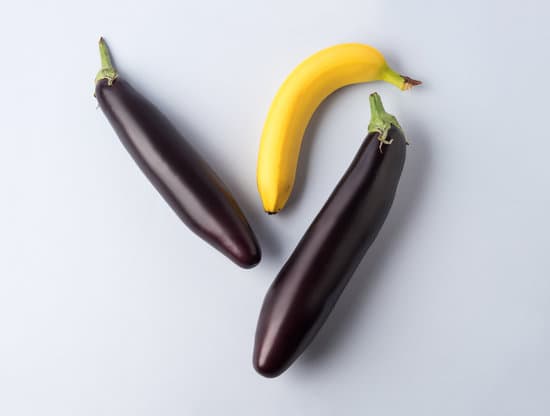 canva eggplants and banana on gray background MAEfISpYhTY