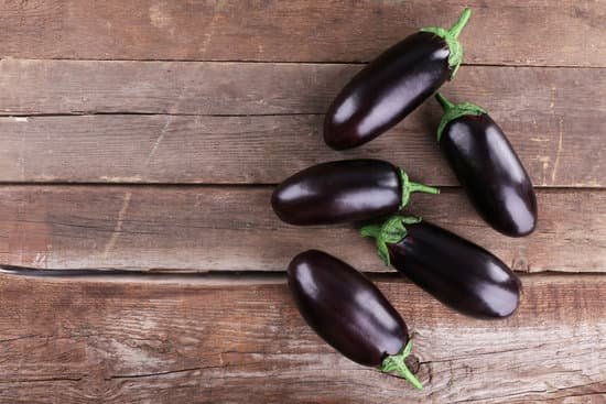 canva eggplants on wooden background MAD MaF3F s