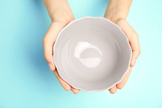canva female hands and empty bowl on turquoise background MAD QvzLRsw