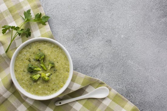 canva flat lay broccoli bisque kitchen towel with copy space MAEsCsrNLws