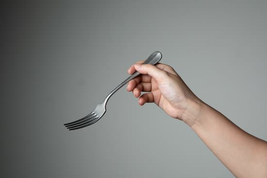 canva fork with hand on grey background utensil kitchen for cooking MAEUsbFmFNs